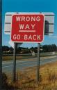 wrong way go back sign
