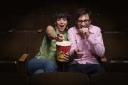 people laughing theater